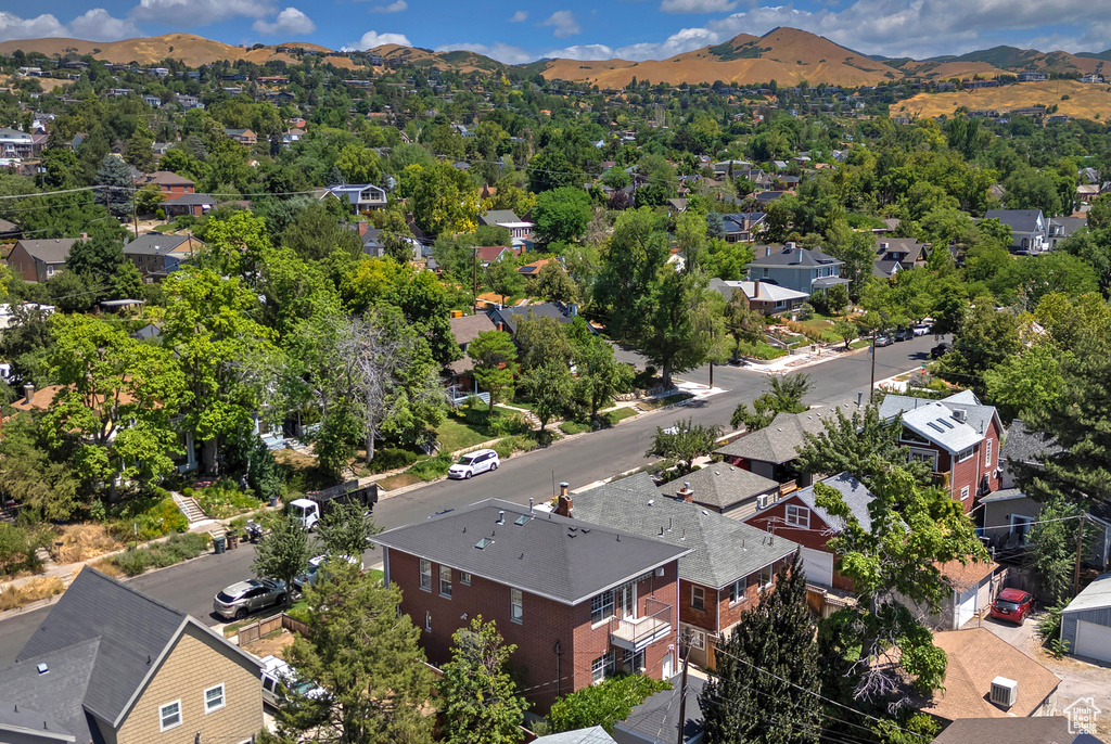 Birds eye view of property with a mountain view