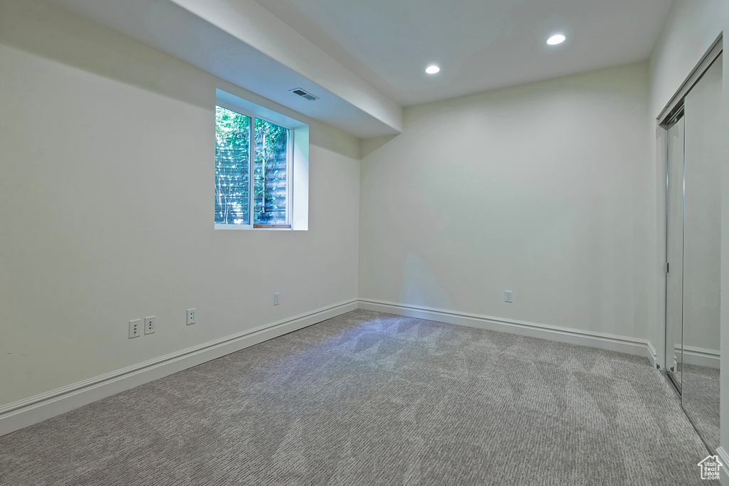 Empty room featuring carpet