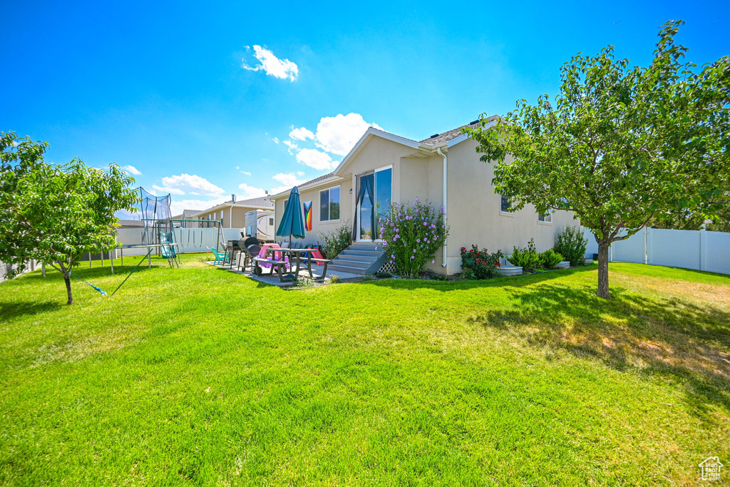 View of yard featuring a patio