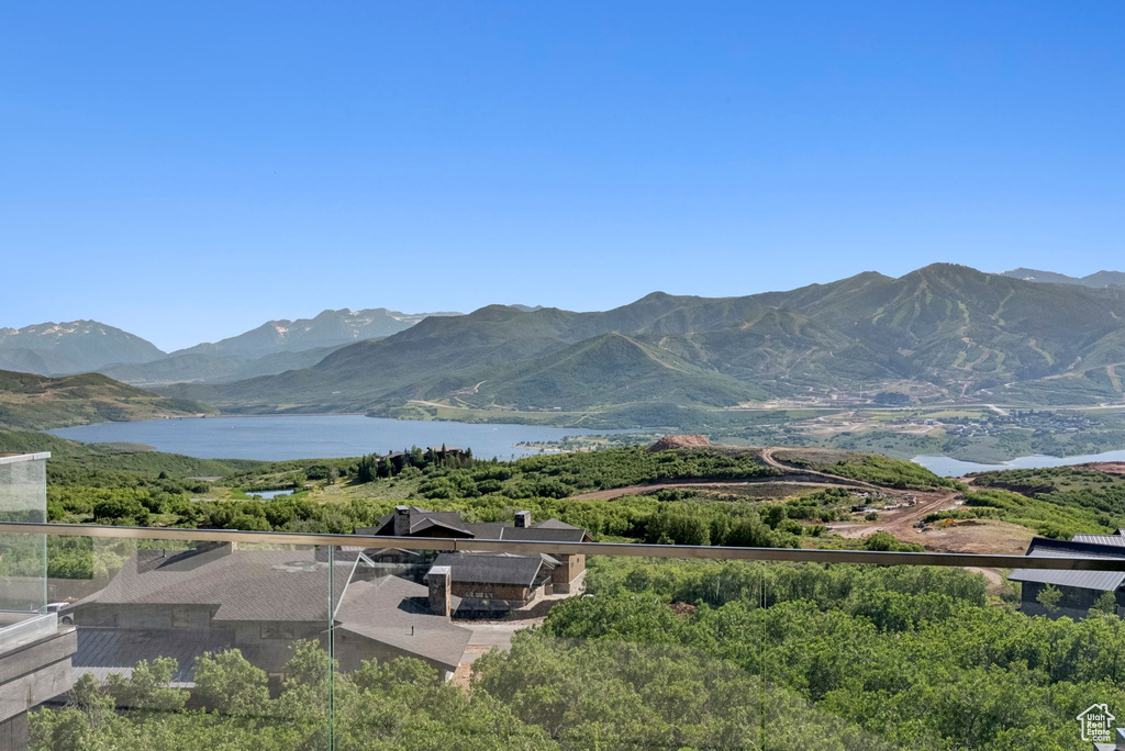 Mountain view featuring a nearby body of water