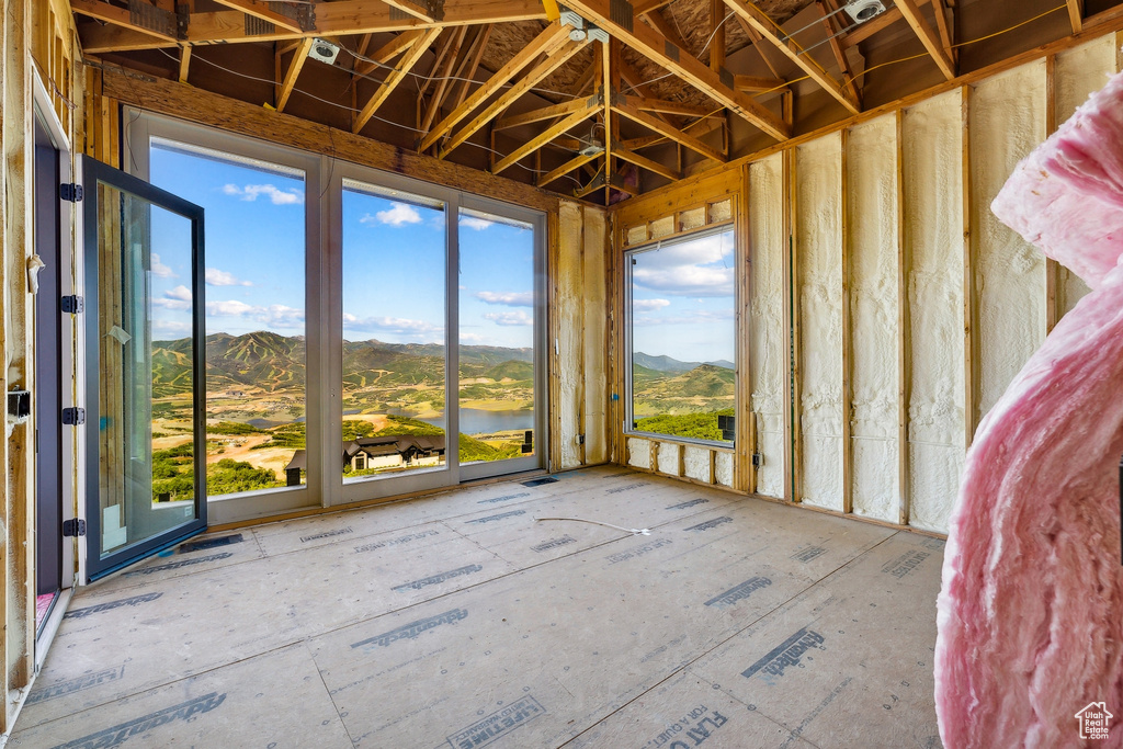 Unfurnished sunroom with plenty of natural light