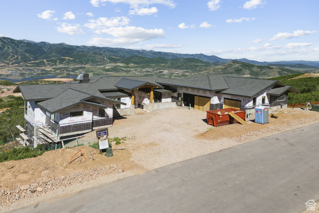 View of front of home featuring a mountain view