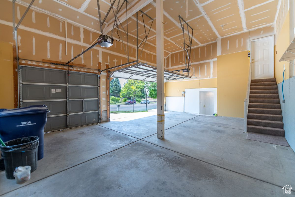 Garage featuring a garage door opener