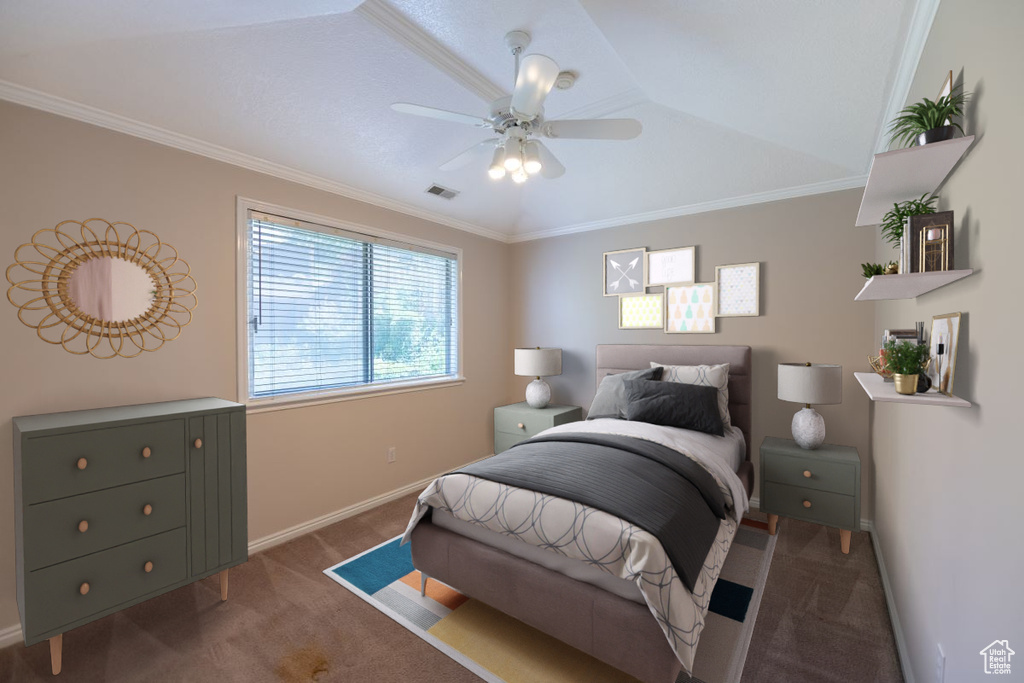 Bedroom with ornamental molding, carpet, and ceiling fan