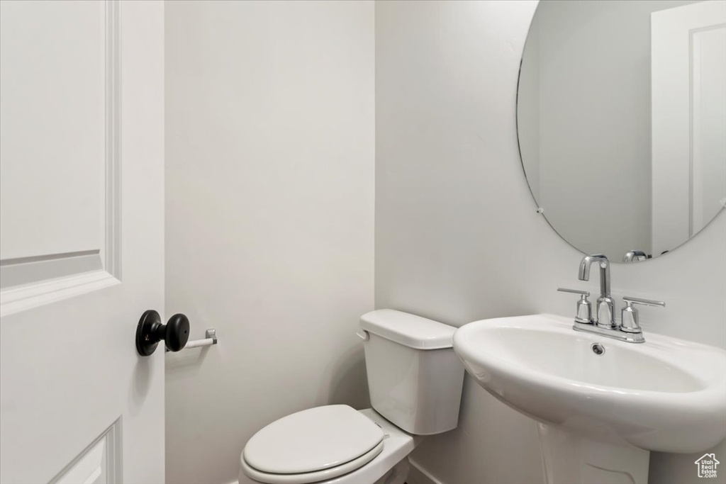 Bathroom featuring toilet and sink