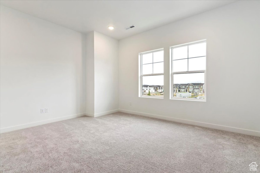 View of carpeted spare room