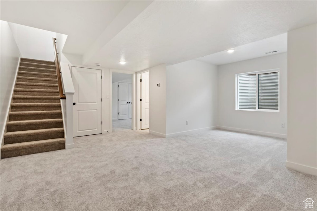 View of carpeted spare room