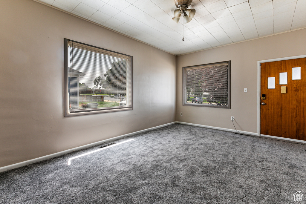 Interior space featuring ceiling fan