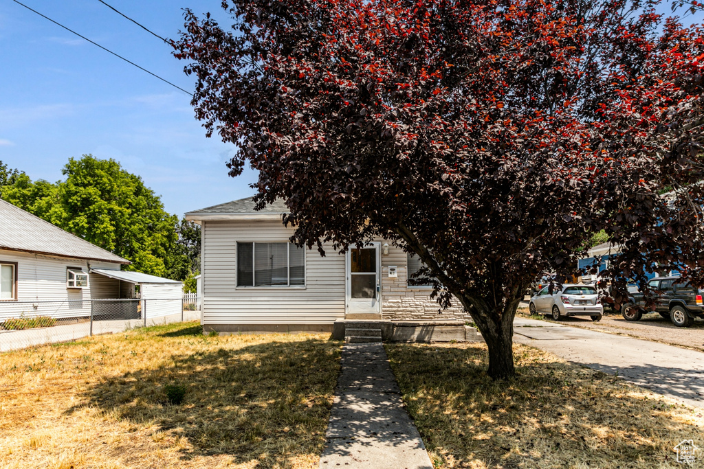 View of front of house with a front lawn