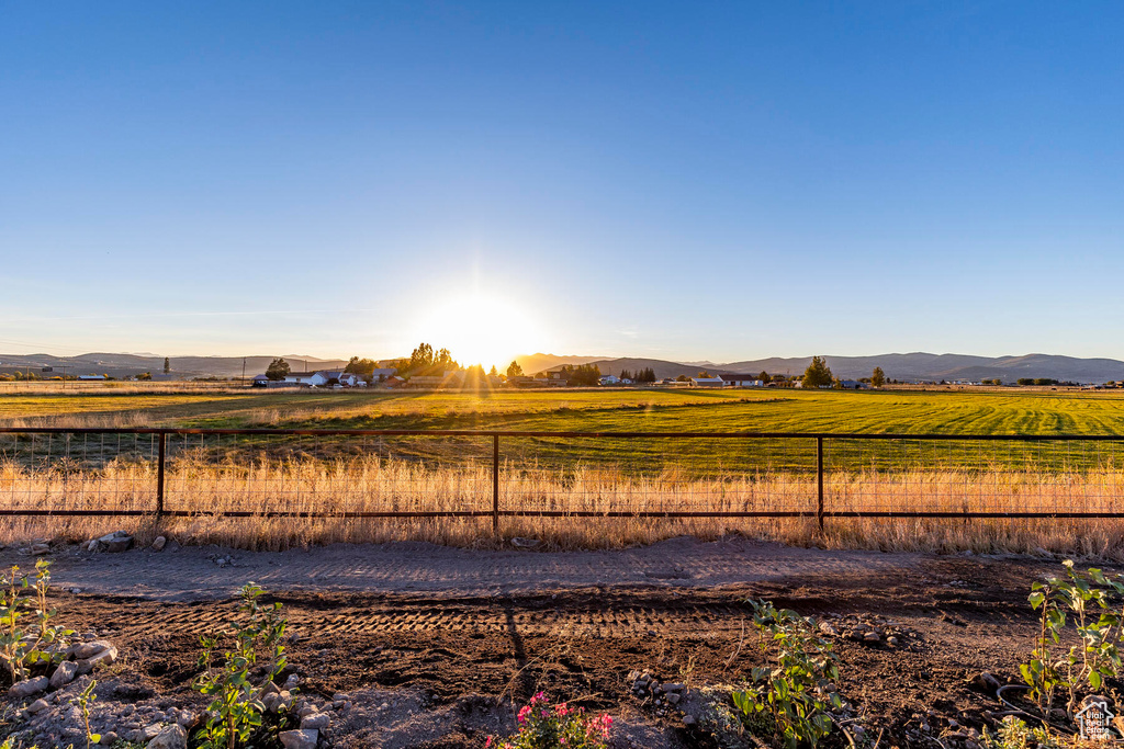 View of yard featuring a mountain view and a rural view