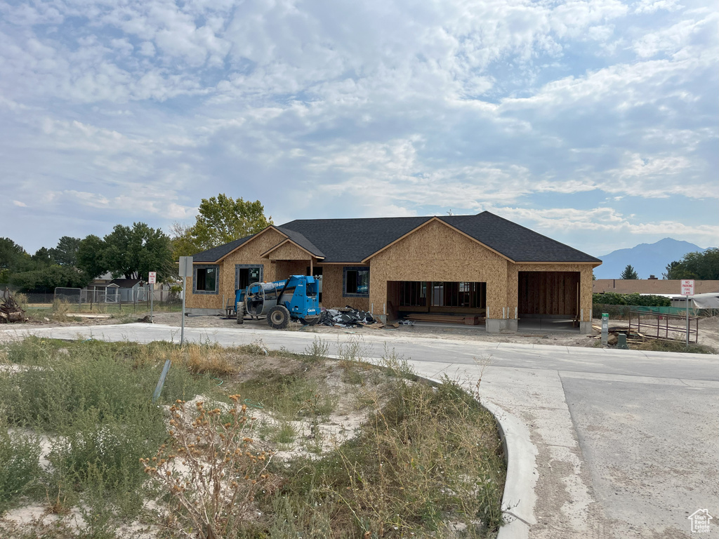 View of front of house with a mountain view