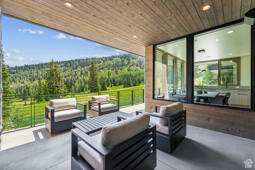 View of patio / terrace with a balcony and outdoor lounge area