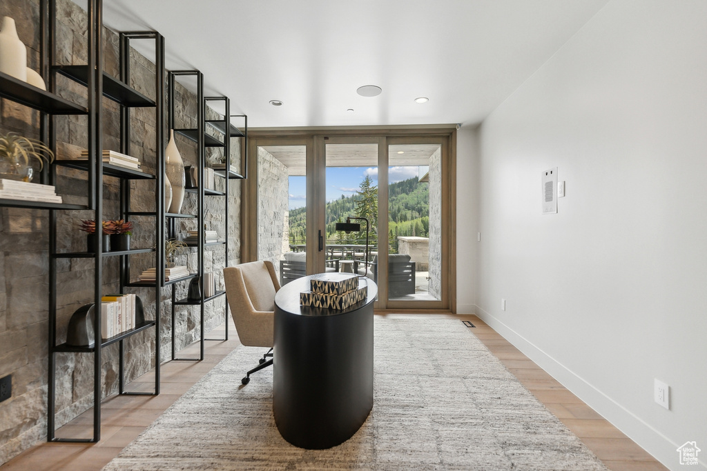 Sitting room featuring light wood-type flooring