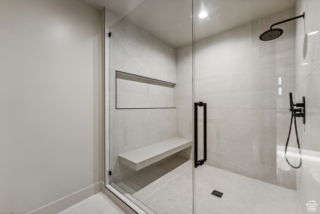 Bathroom featuring a shower with shower door