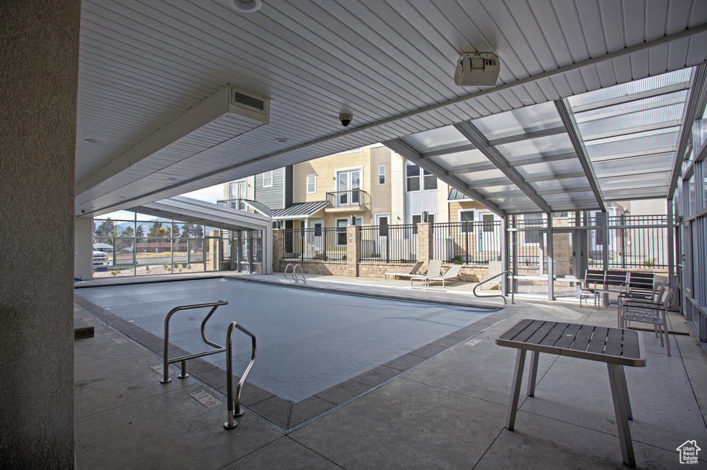 View of swimming pool with a patio