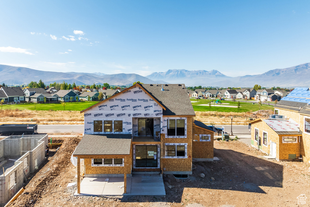 View of front of house featuring a mountain view