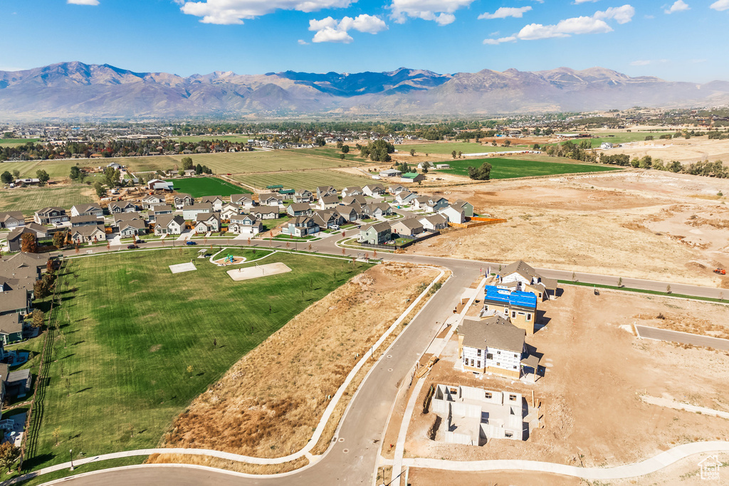 Birds eye view of property with a mountain view