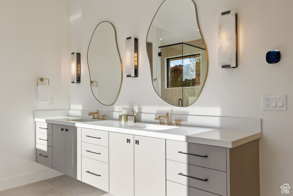 Bathroom with vanity and tile patterned floors