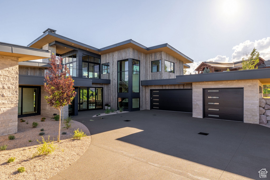 Contemporary house featuring a garage