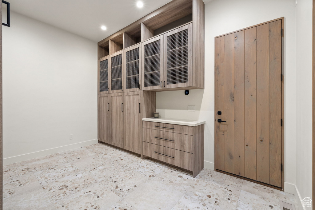 Interior space featuring light tile patterned flooring