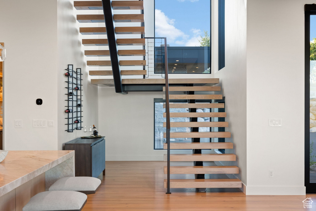 Staircase with wood-type flooring