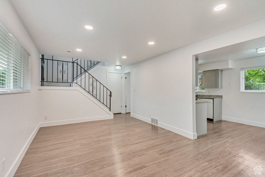 Unfurnished living room featuring light hardwood / wood-style flooring