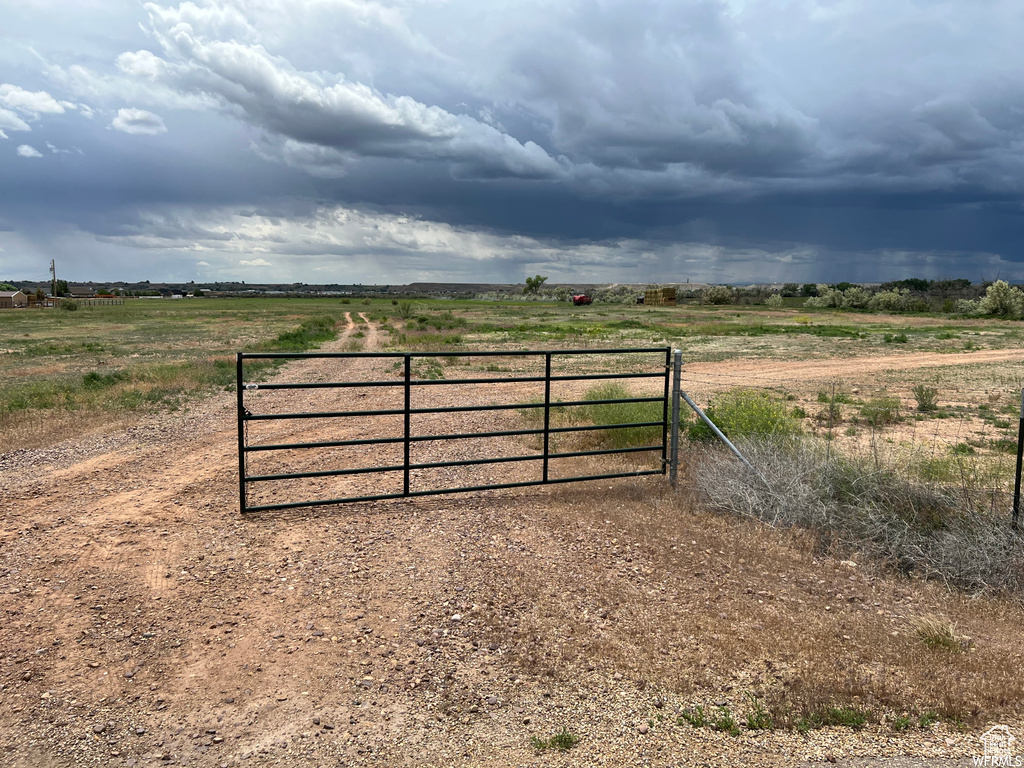 View of gate featuring a rural view