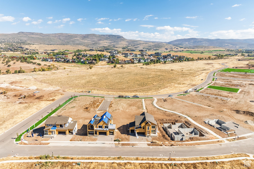 Birds eye view of property featuring a mountain view