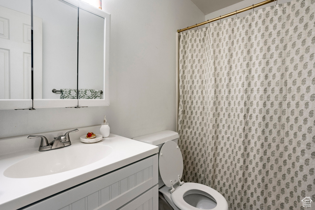 Bathroom with vanity and toilet