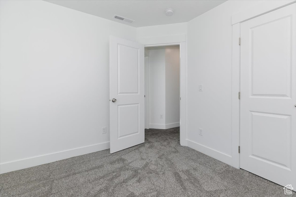 Interior space with light colored carpet