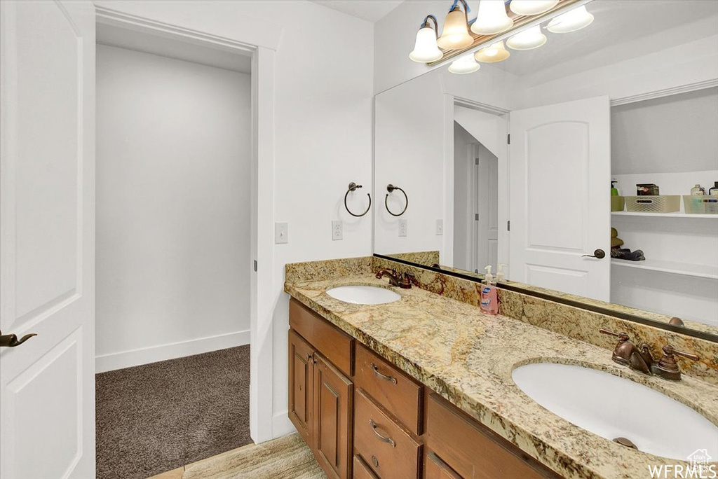 Bathroom featuring double vanity