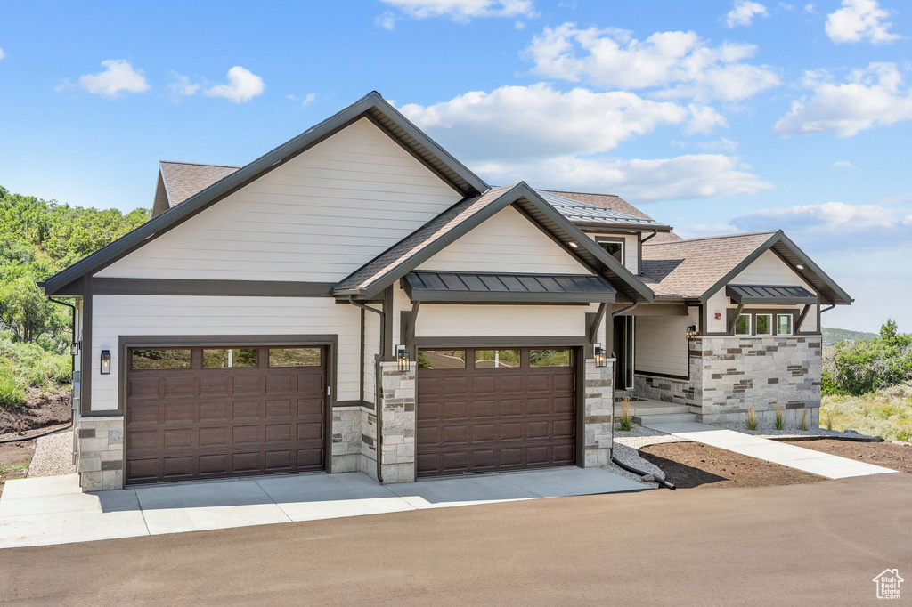 View of front facade with a garage