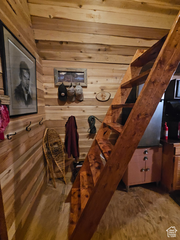 Interior space featuring wood walls