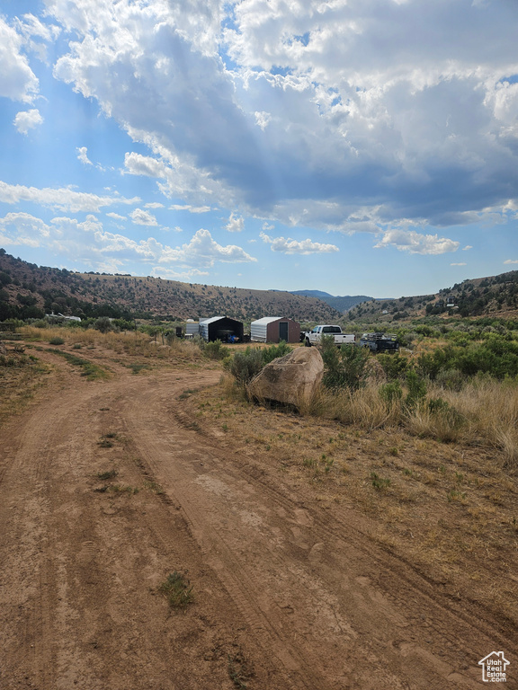 View of mountain feature with a rural view