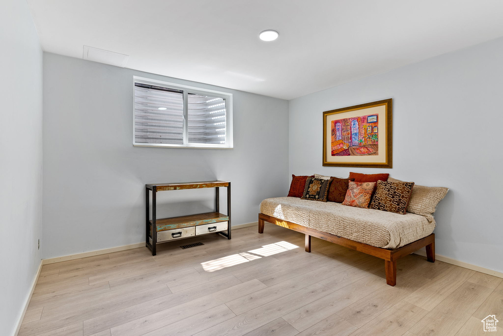 Sitting room featuring light hardwood / wood-style floors