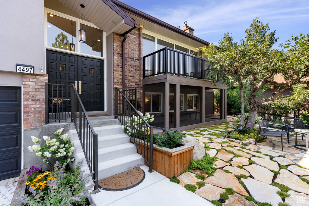 Exterior space featuring a balcony