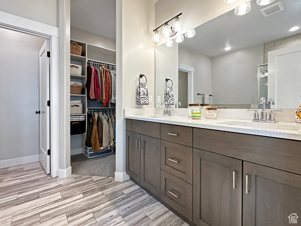 Bathroom featuring dual vanity