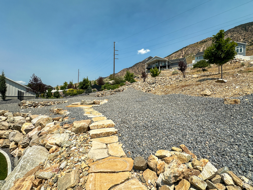 View of yard with a mountain view