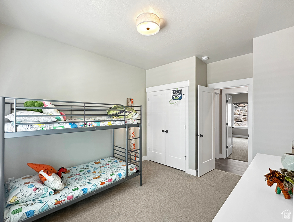 Bedroom with carpet