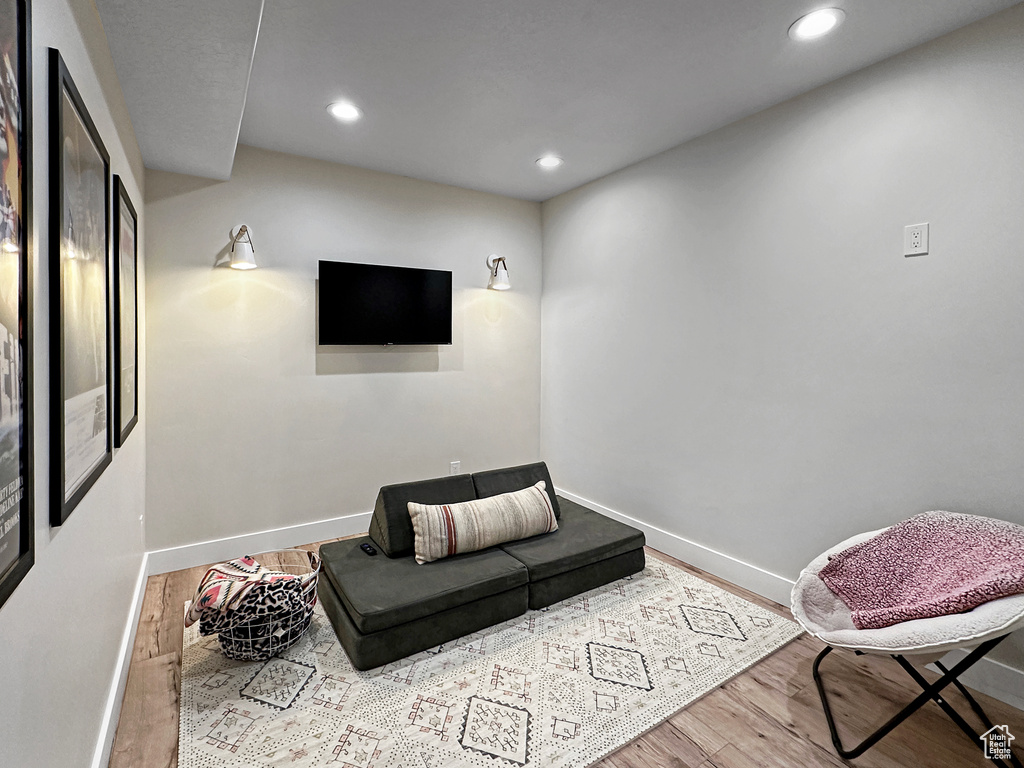 Living area featuring wood-type flooring