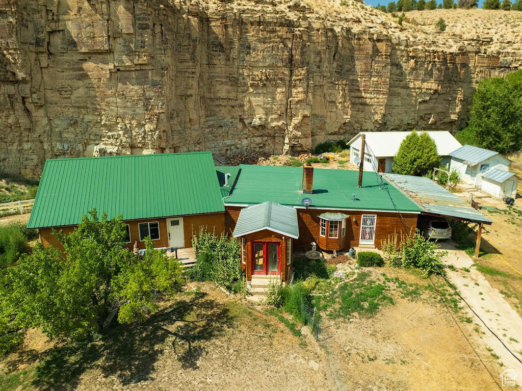 View of front facade featuring a carport