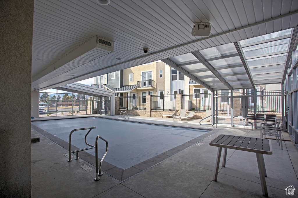 View of pool featuring a patio area