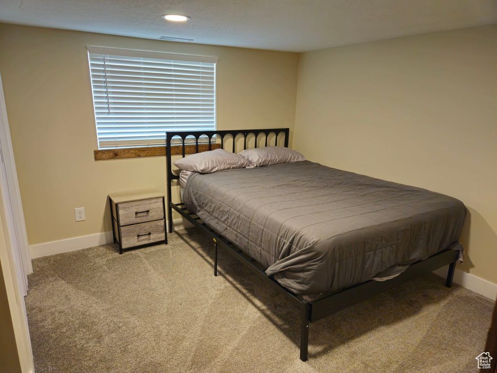 Bedroom featuring carpet flooring