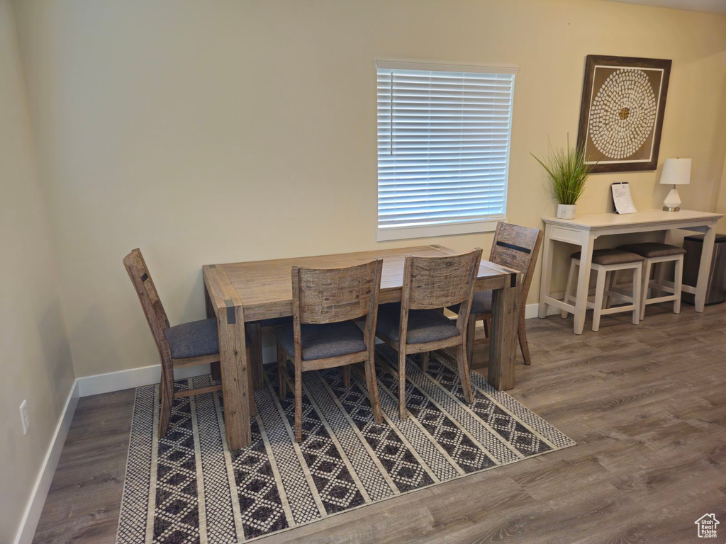 Dining room with hardwood / wood-style floors