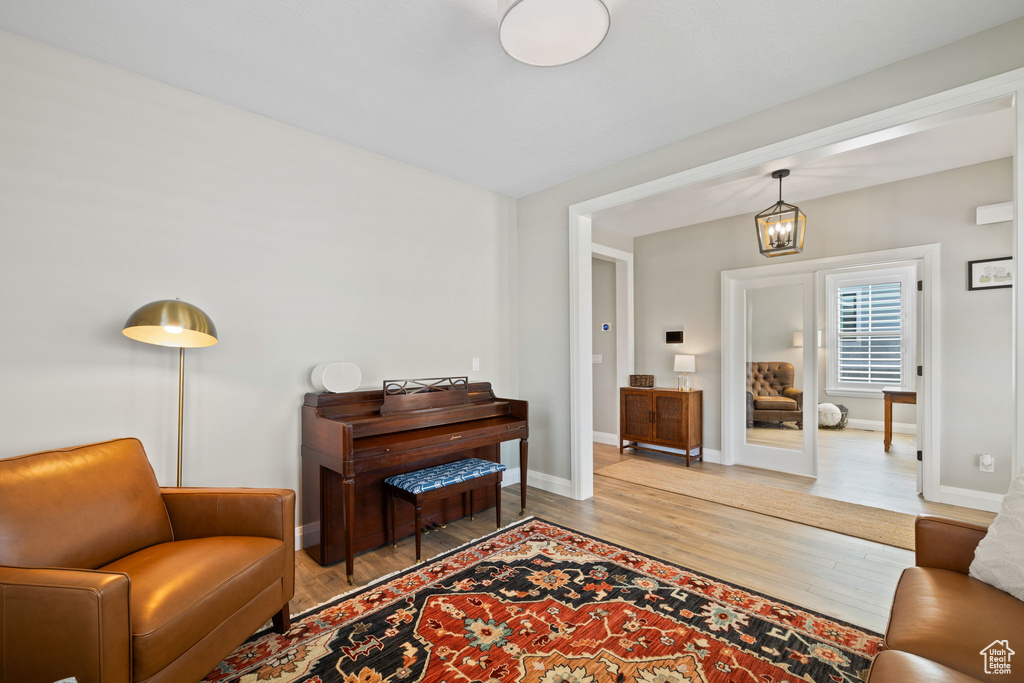 Living area with light hardwood / wood-style floors