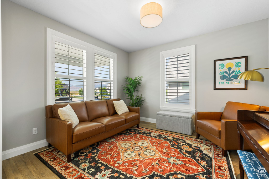 Living room with light wood-type flooring