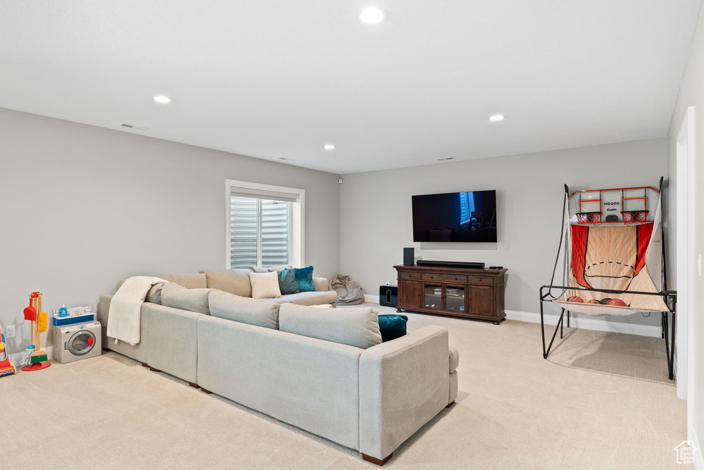 Living room with light colored carpet