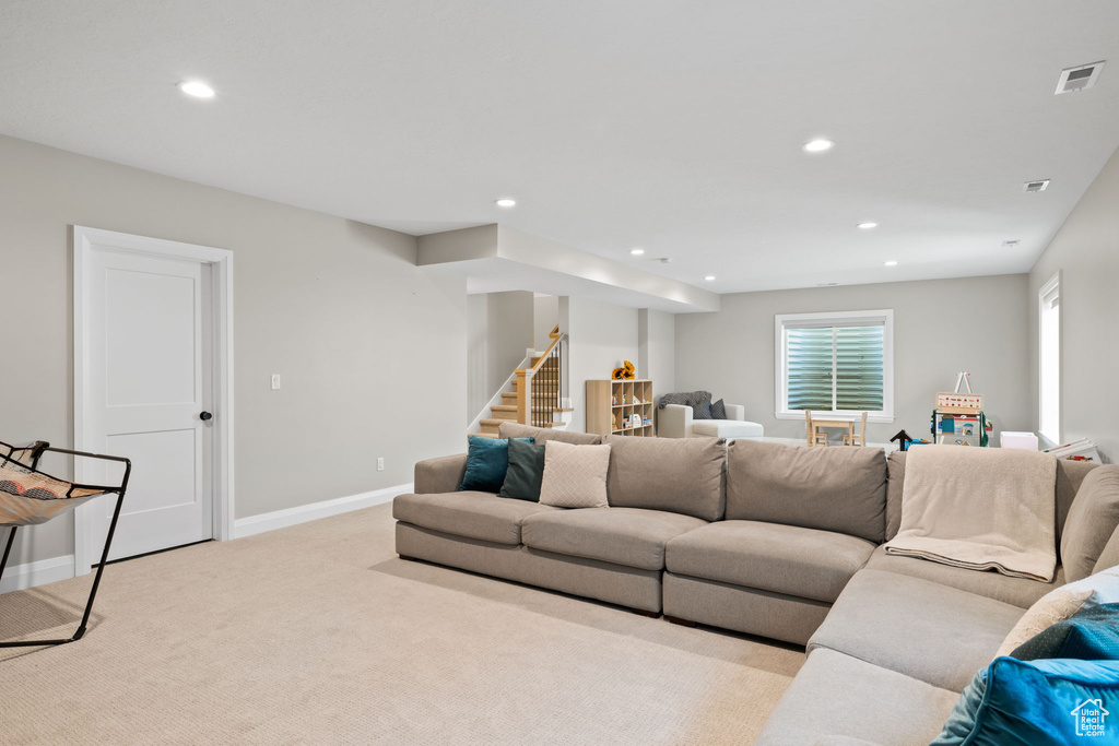 Living room with light colored carpet