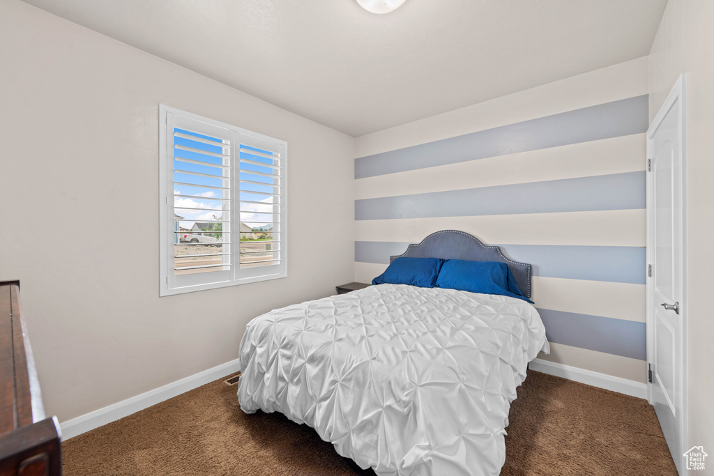 Bedroom featuring carpet floors