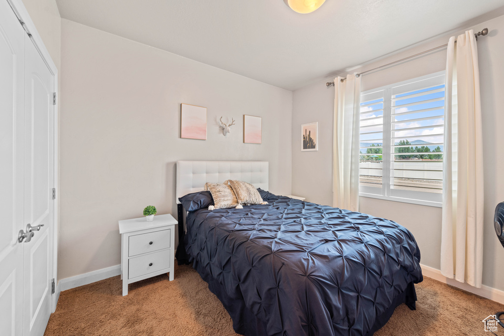 View of carpeted bedroom